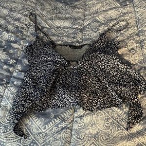 Beautiful shirt, size medium, worn twice. Has a little hole in front for style.